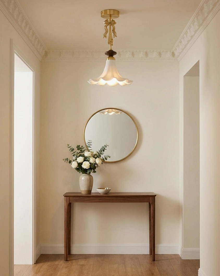 Bellora vintage ceiling light installed in residential entryway above console table with French country warm interior design