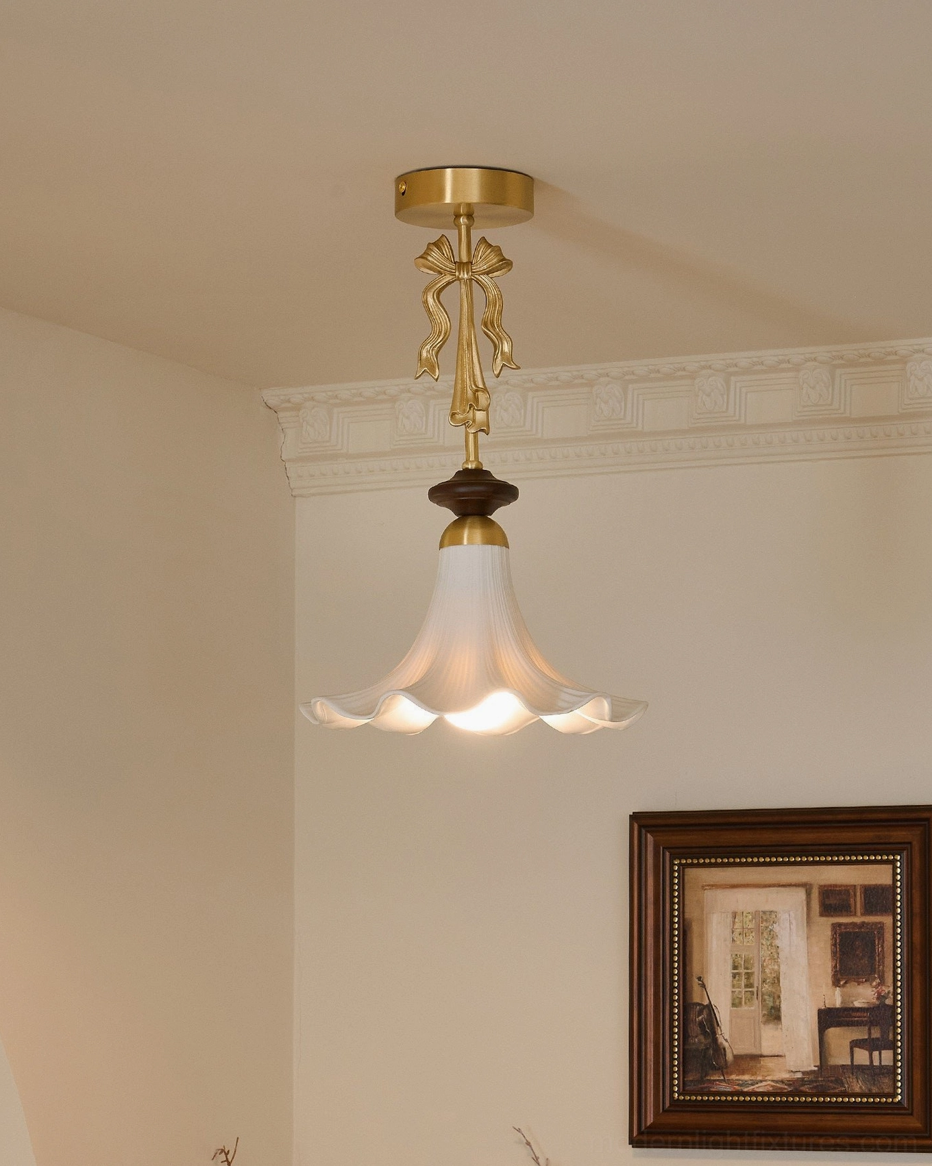 Bellora vintage ceiling fixture with walnut wood accent ring, brass bow, and pleated ceramic flower shade - side angle view