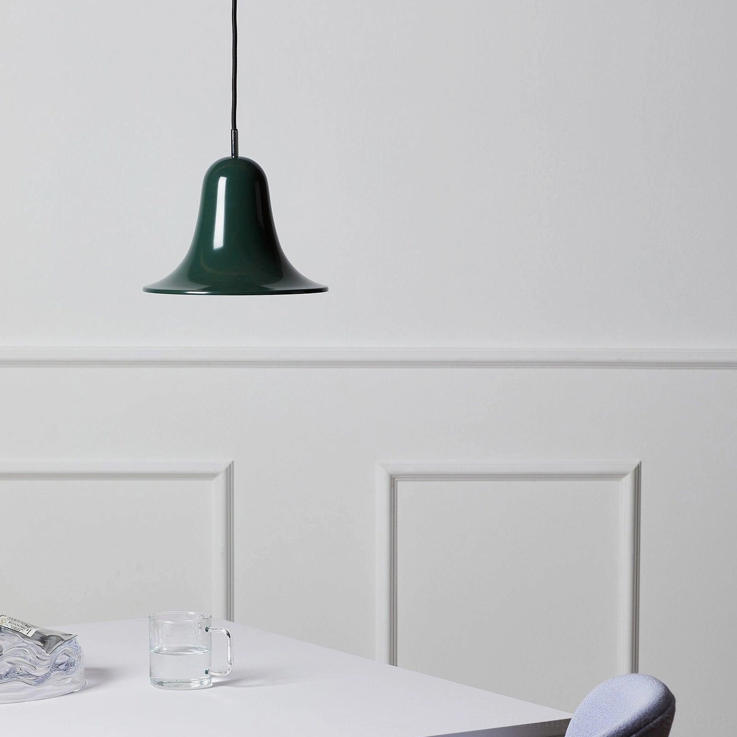 Dark green Bells pendant light with white wainscoting dining background, modern ceiling lamp in traditional-contemporary setting