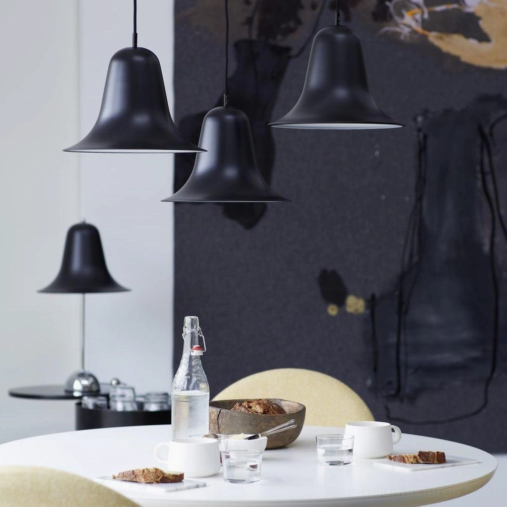 Bells modern pendant light in monochromatic interior setting, single color sophisticated lighting design arrangement