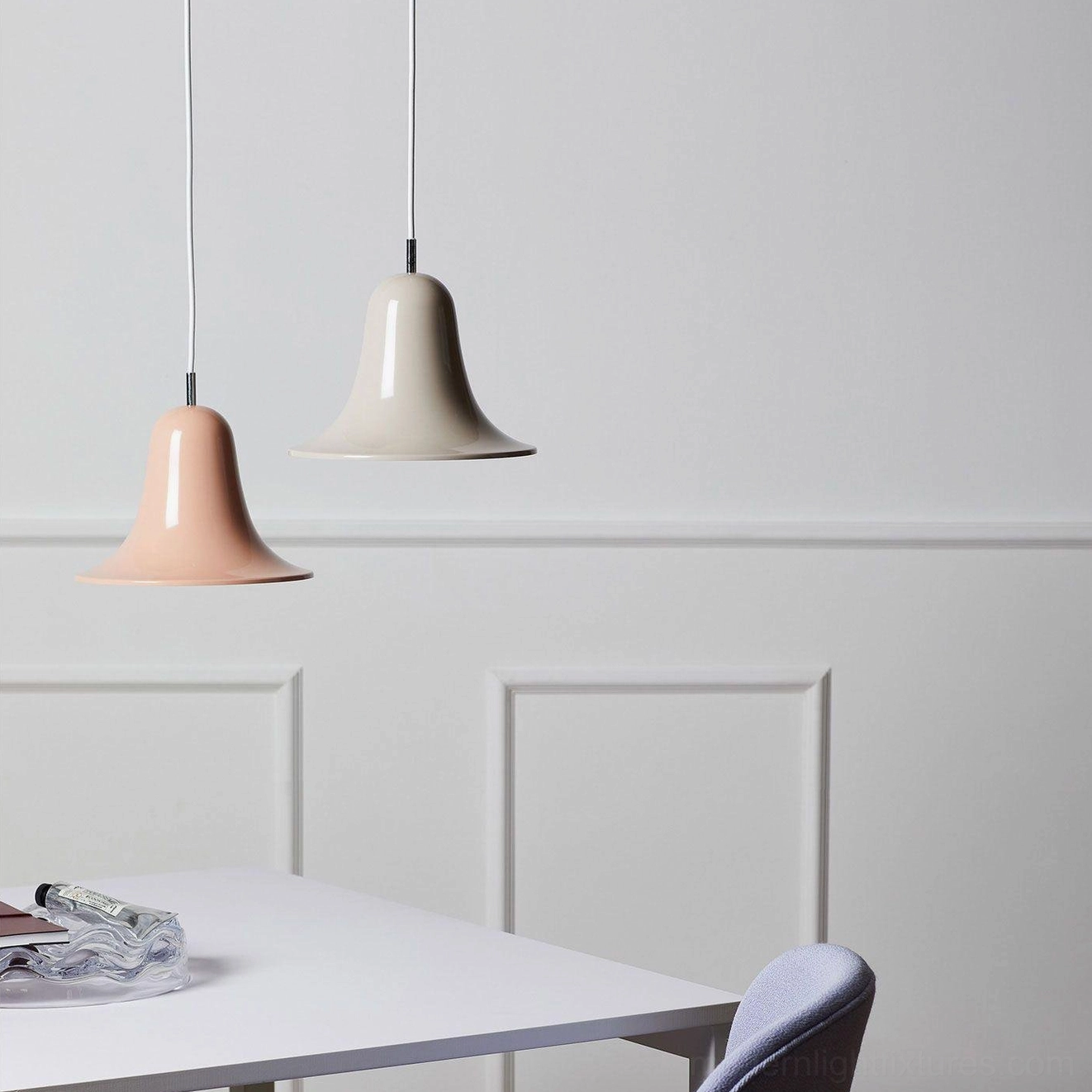 Pink and beige Bells ceiling pendant lamps close-up detail view, pastel contemporary lights with gloss finish in dining setting