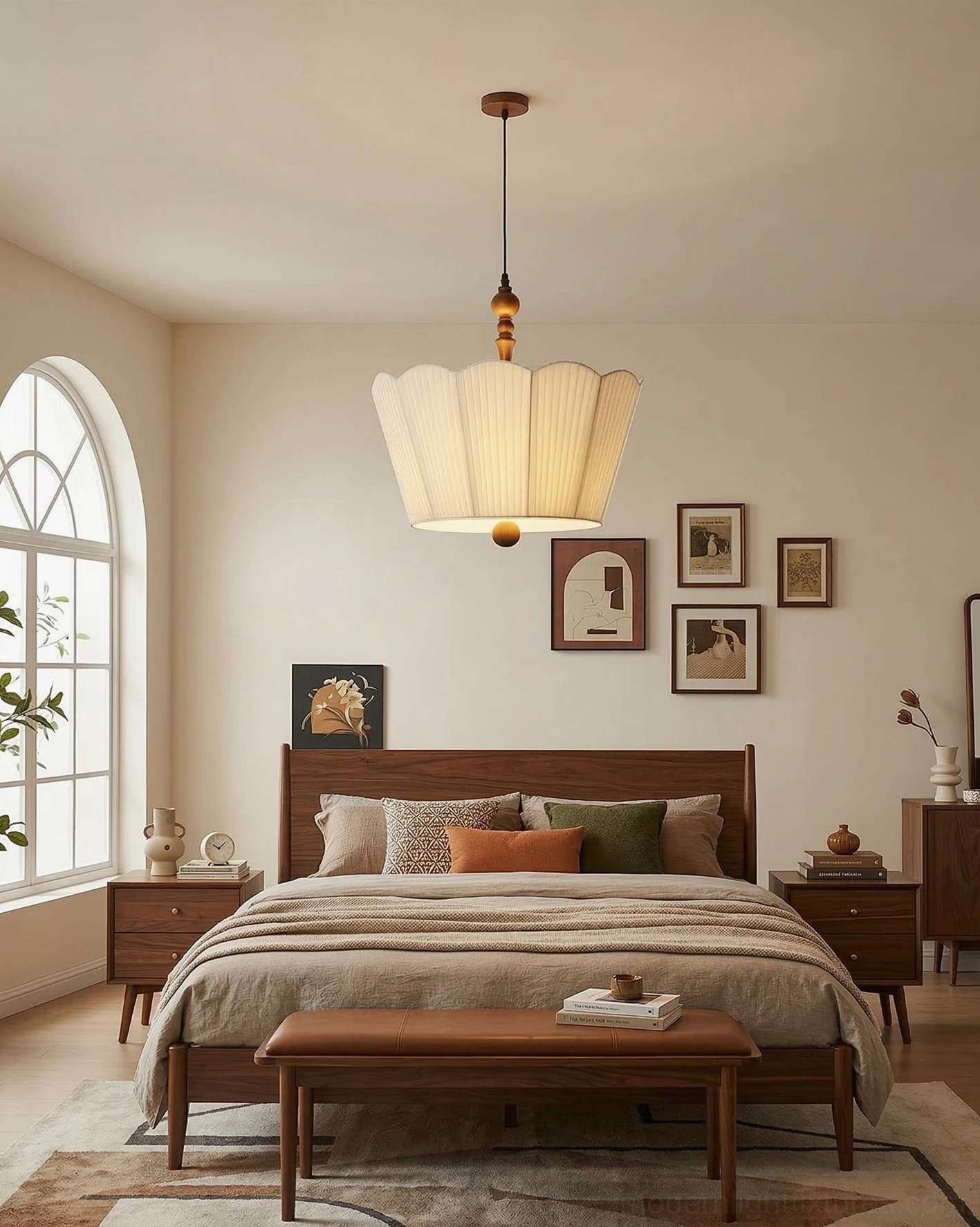 Bellune pleated pendant lamp over cozy mid-century modern master bedroom with warm lighting