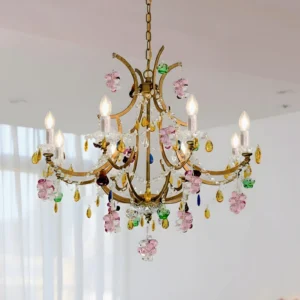 8-head Beloria crystal chandelier angled detail showing jewel-tone glass droplets and candle-style bulbs