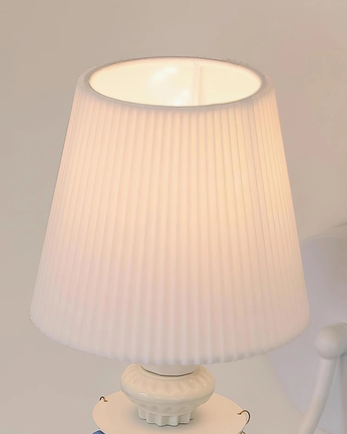 Belvianne wall sconce paired installation showing symmetrical mounting for balanced ambient lighting in residential room