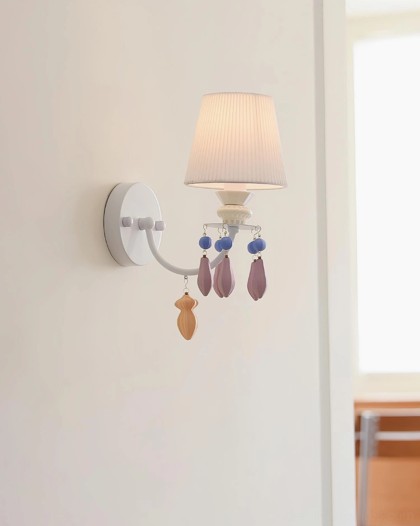 Belvianne ceramic wall sconce detailed view of pastel beaded pendant decorations in lilac peach and blue tones