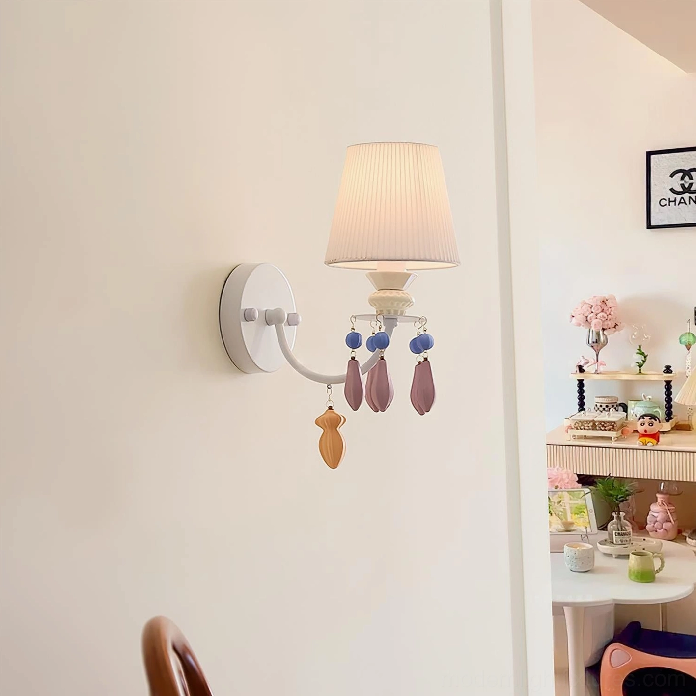 Belvianne wall sconce installation on residential interior wall showing lighting effect and ambient glow from ceramic shade
