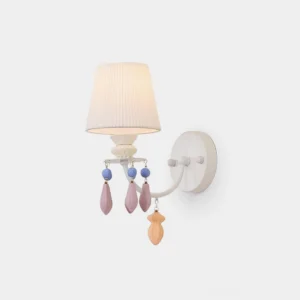 Belvianne ceramic wall sconce with single pleated shade and pastel lilac peach blue beaded pendants frontal close-up view studio lighting