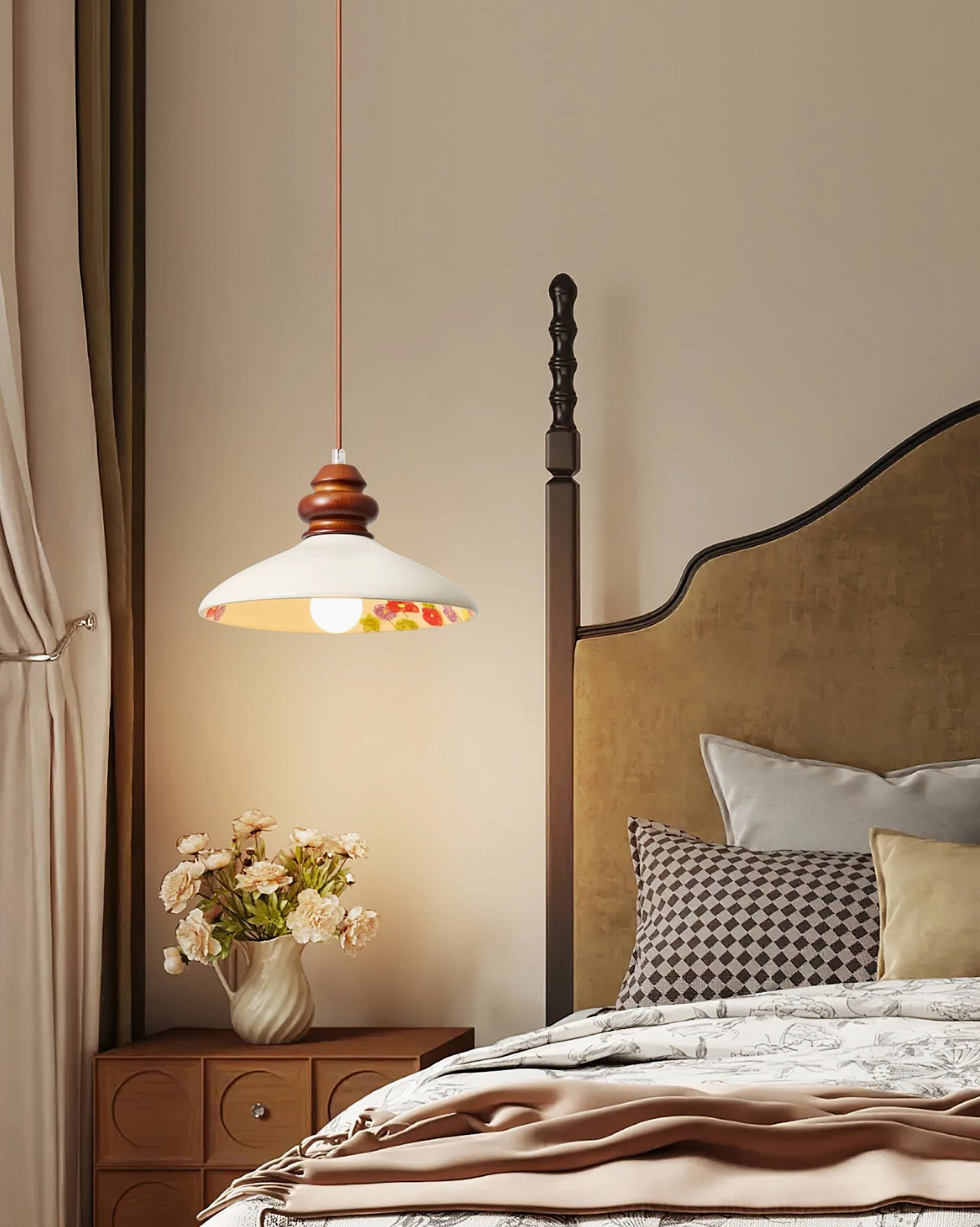 Belvin pendant light installed above bedroom nightstand with warm ambient glow