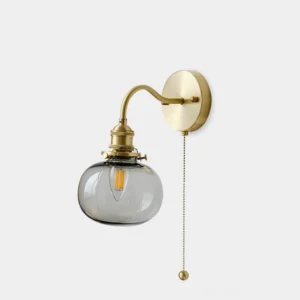Berliner brass wall sconce with clear smoked glass globe front view studio lighting