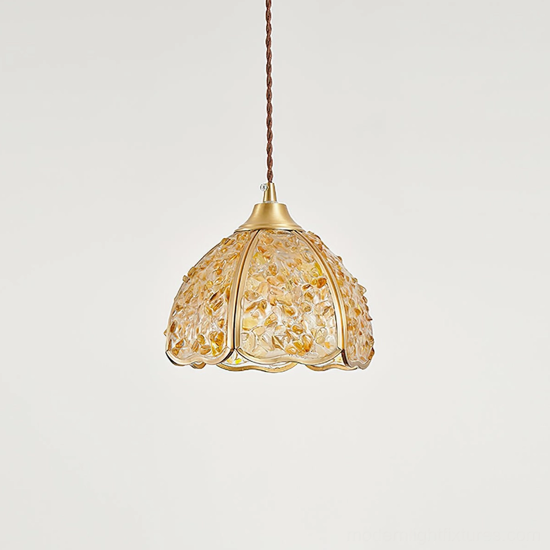 Amber Beryl hand-crafted agate pendant light with warm glow and scalloped silhouette