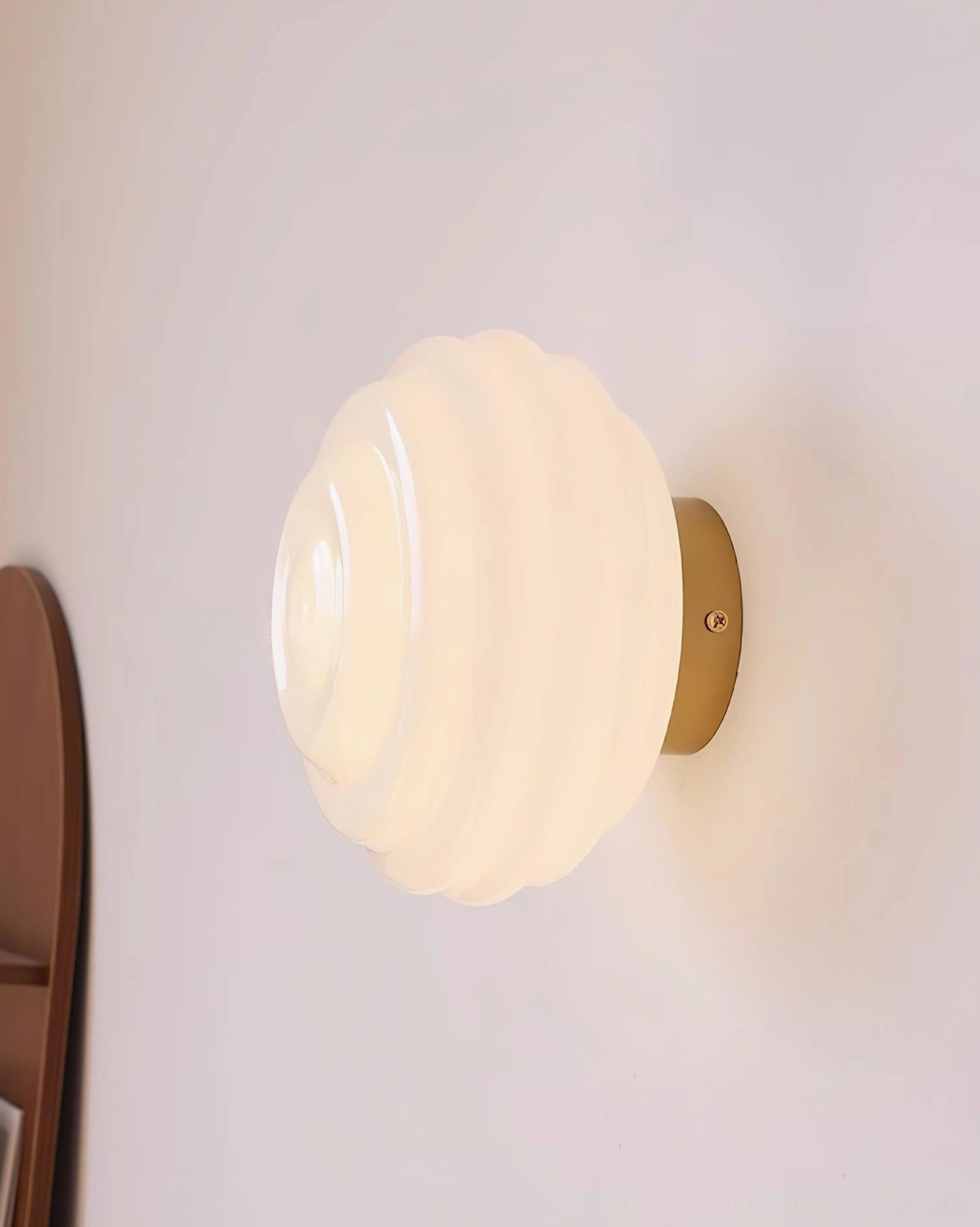 Beverly modern wall sconce fixture gold base ribbed glass shade detail shot