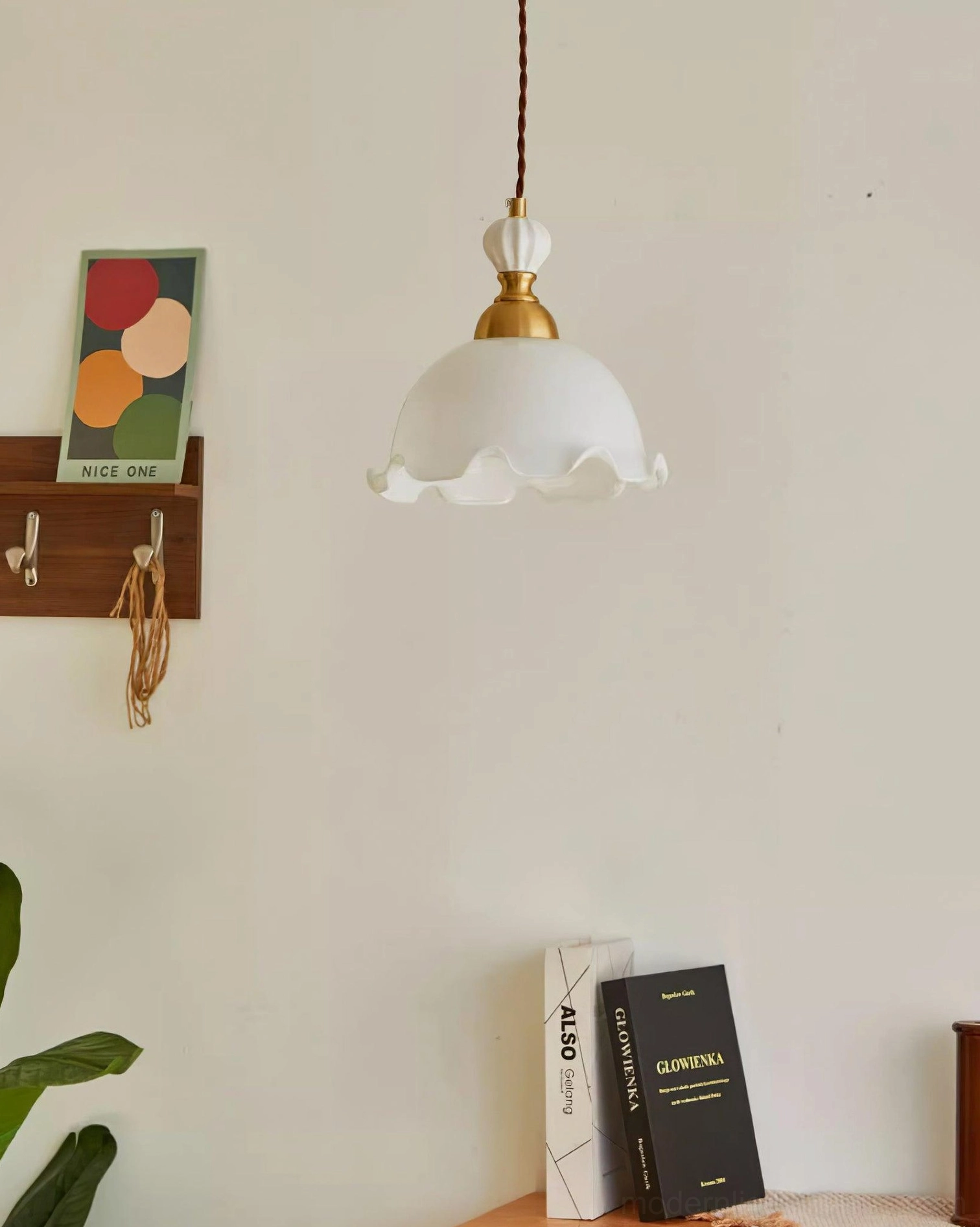 Bianca glass pendant light with brass hardware, detailed view of wavy rim glass shade and metal frame
