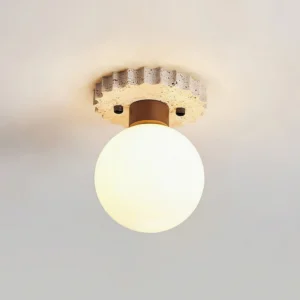 Bianca ceiling light fixture installed on residential ceiling, illuminated frosted glass globe with warm wood accent collar
