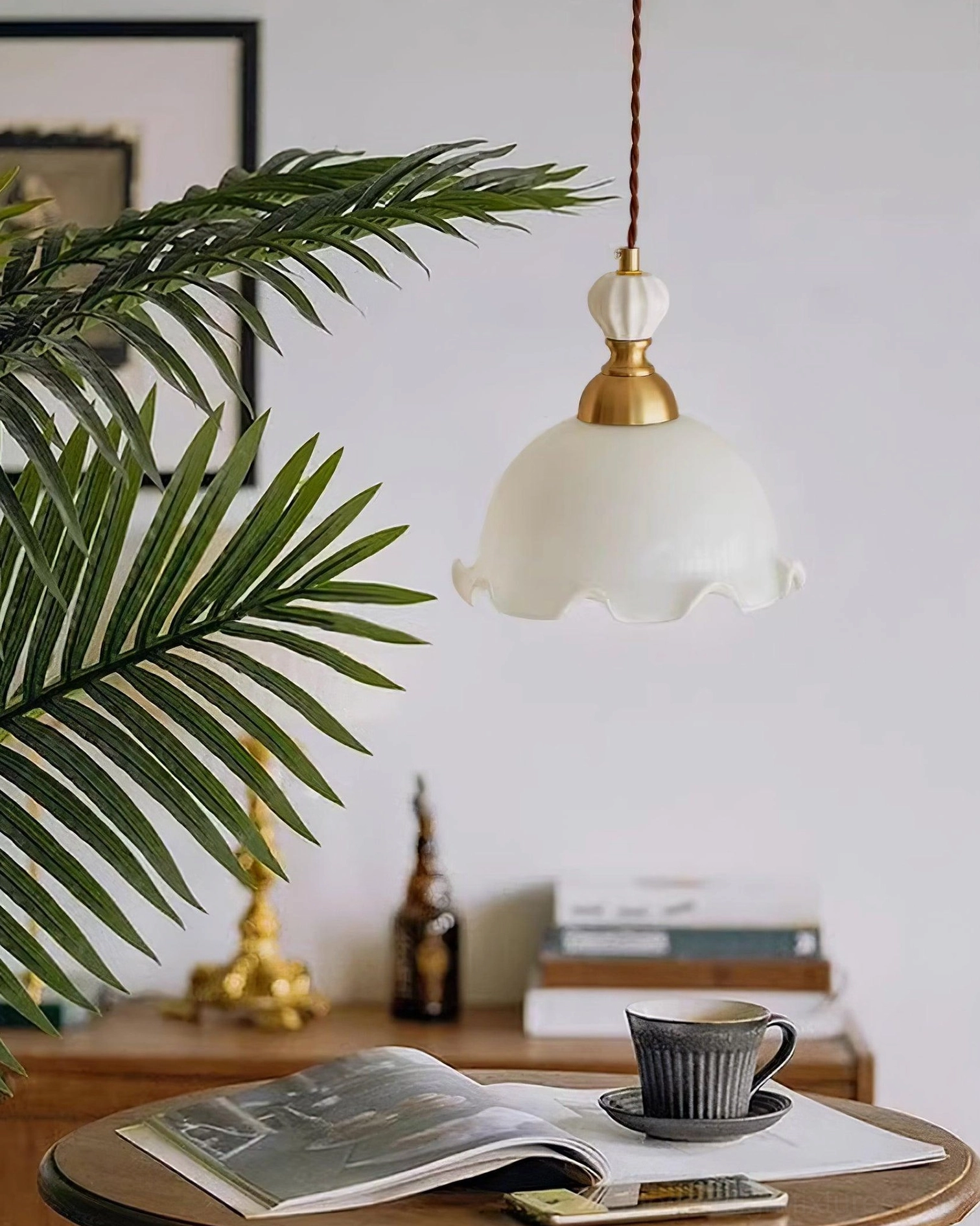 Bianca pendant fixture close-up, white opal glass and brass construction, artisanal pendant light detail