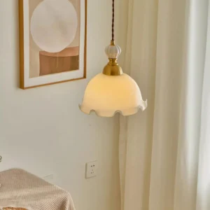 Bianca vintage pendant lamp lit in home interior, warm ambient lighting above table with wall decor