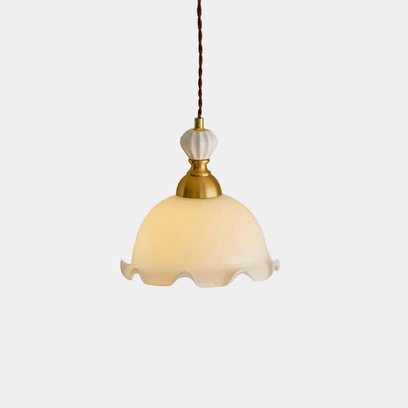 Bianca wavy glass pendant light with brass fixture, front studio view showing white opal glass shade and vintage design
