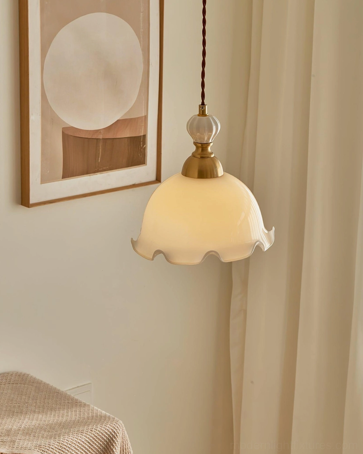 Bianca pendant light three-quarter view, warm yellow illumination, French vintage aesthetic, brass frame