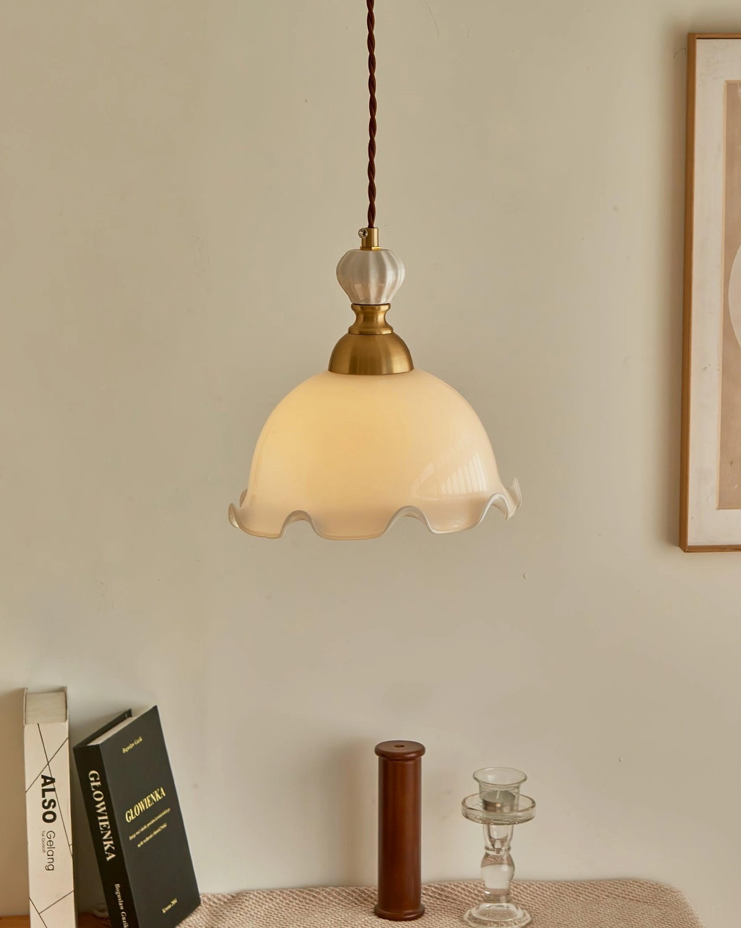 Bianca vintage pendant lamp front view unlit, indoor corner setting with white glass shade and brass accents