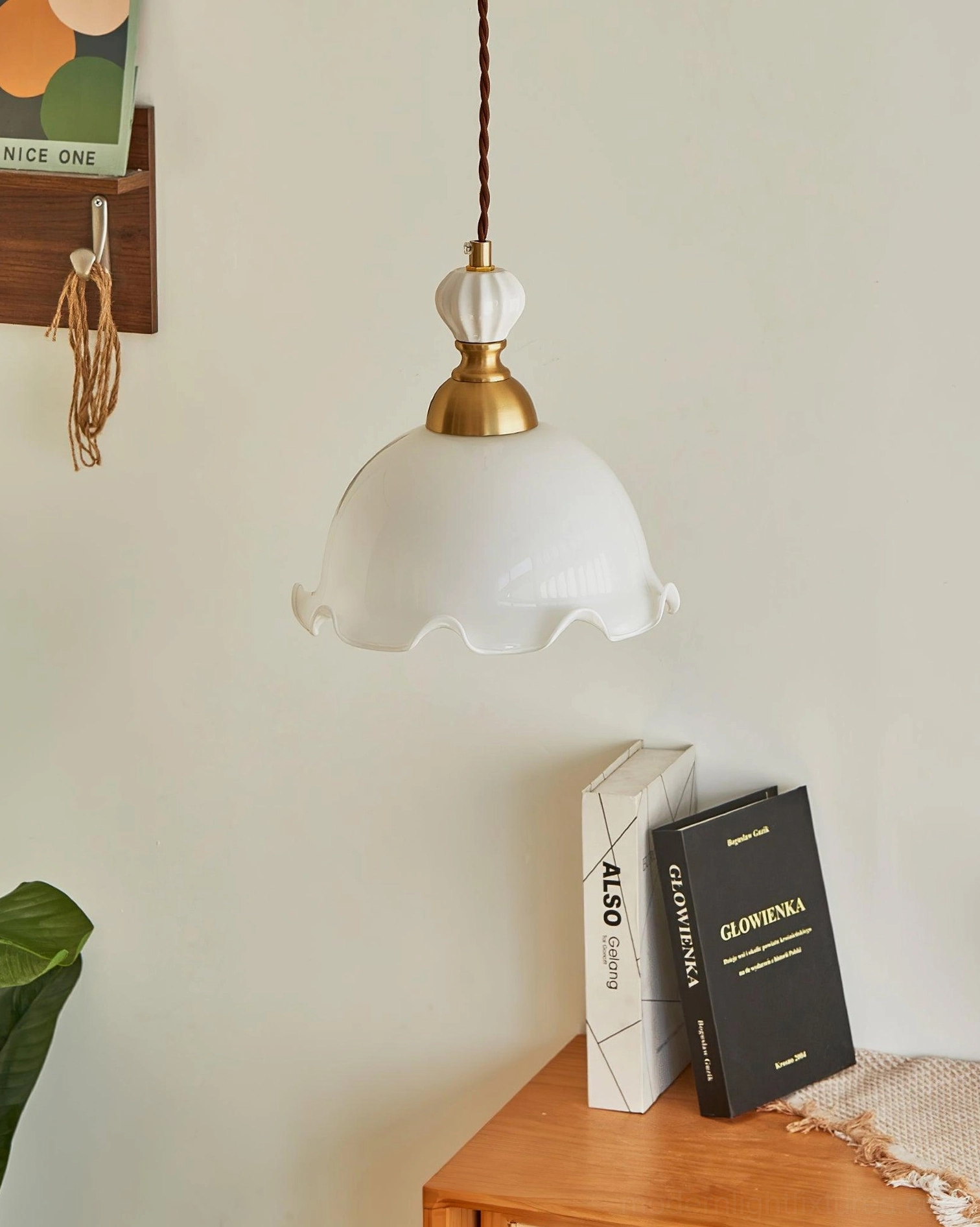Bianca wavy glass pendant shade detail, tabletop area with home decor, retro French design aesthetic