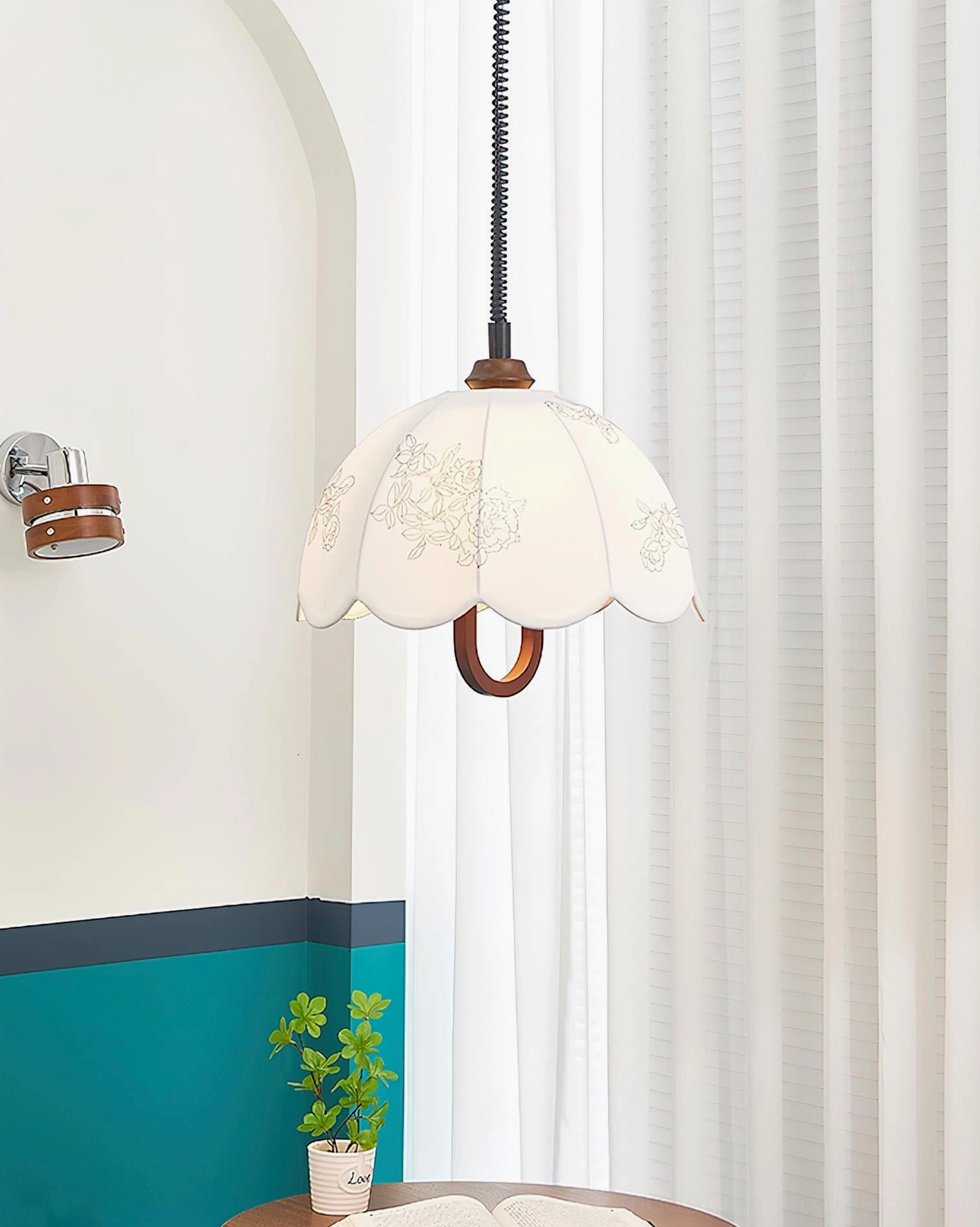 Binta scalloped pendant lamp low angle view teal wall vintage design