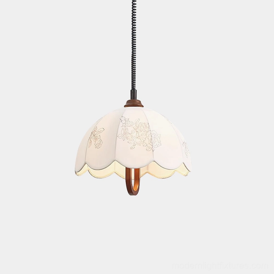 Binta scalloped fabric pendant light front view with floral embroidery and walnut wooden detail