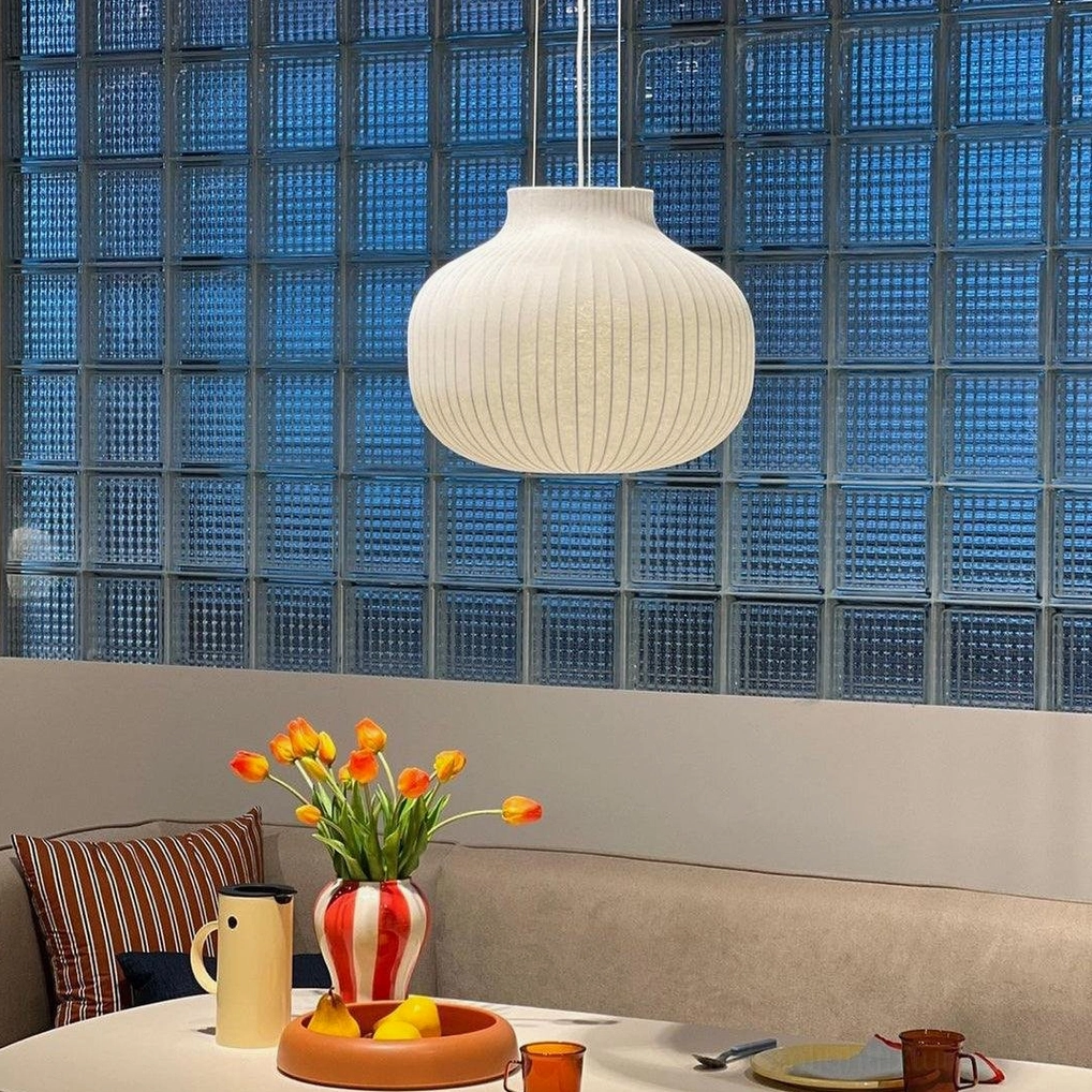 Contemporary cocoon pendant light demonstrating biophilic design principles in modern home