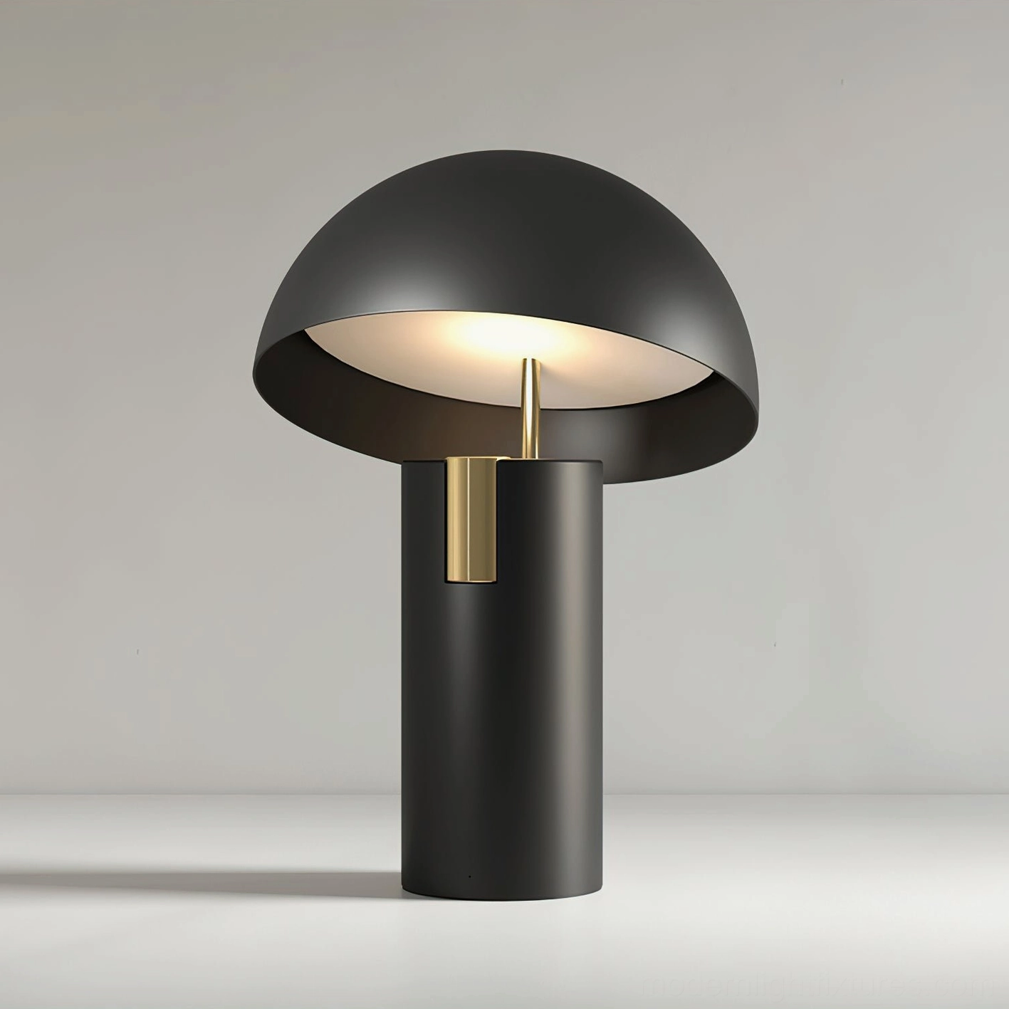 Black Avo LED table lamp with integrated mushroom dome design and brass detail, three-quarter front angle showcase