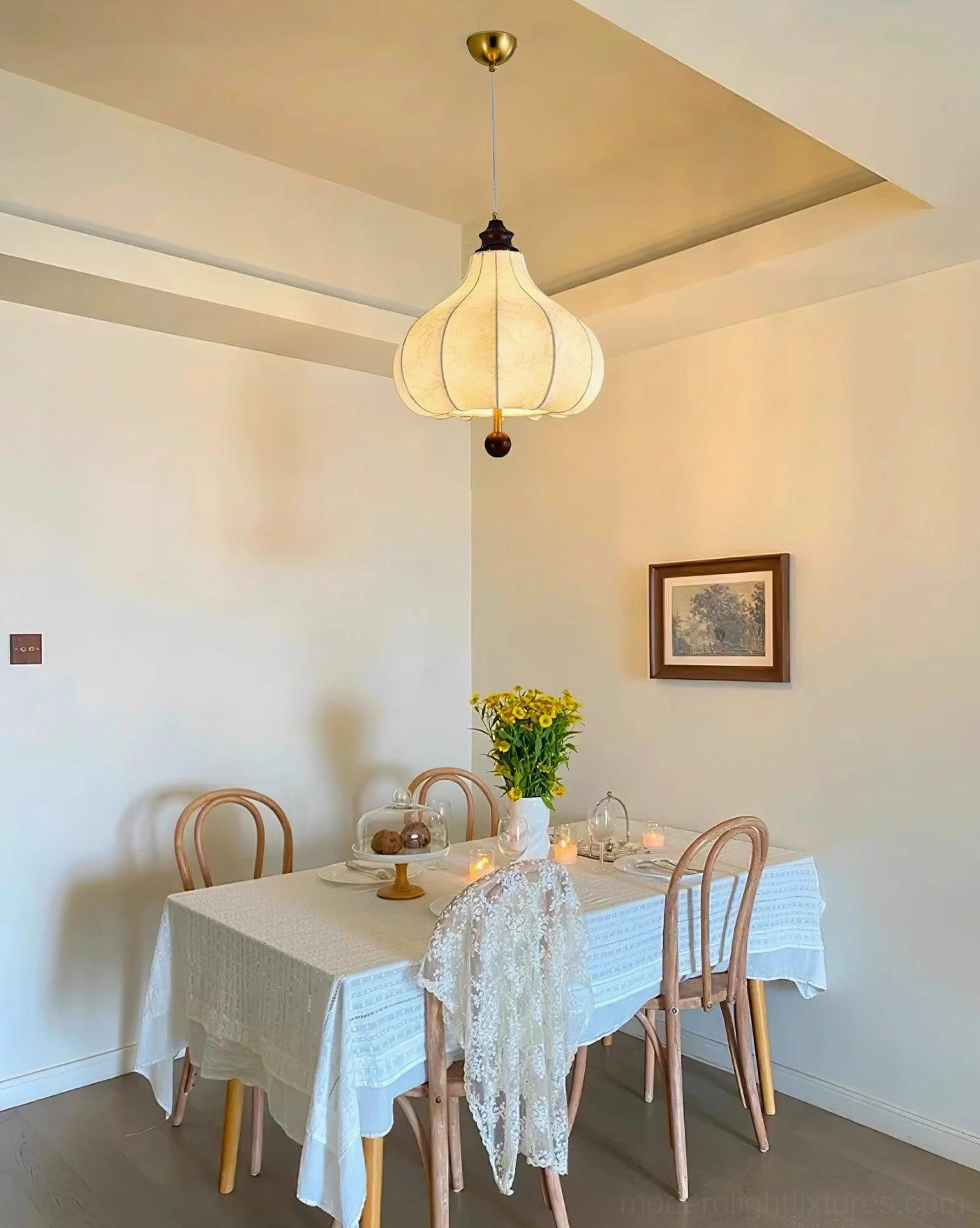 Black finish botanical pendant light showing color finish detail and fabric shade contrast