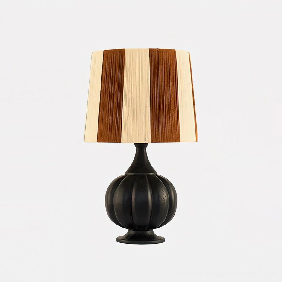 Black and brown wooden striped table lamp showing front-facing view with cotton linen striped shade pattern