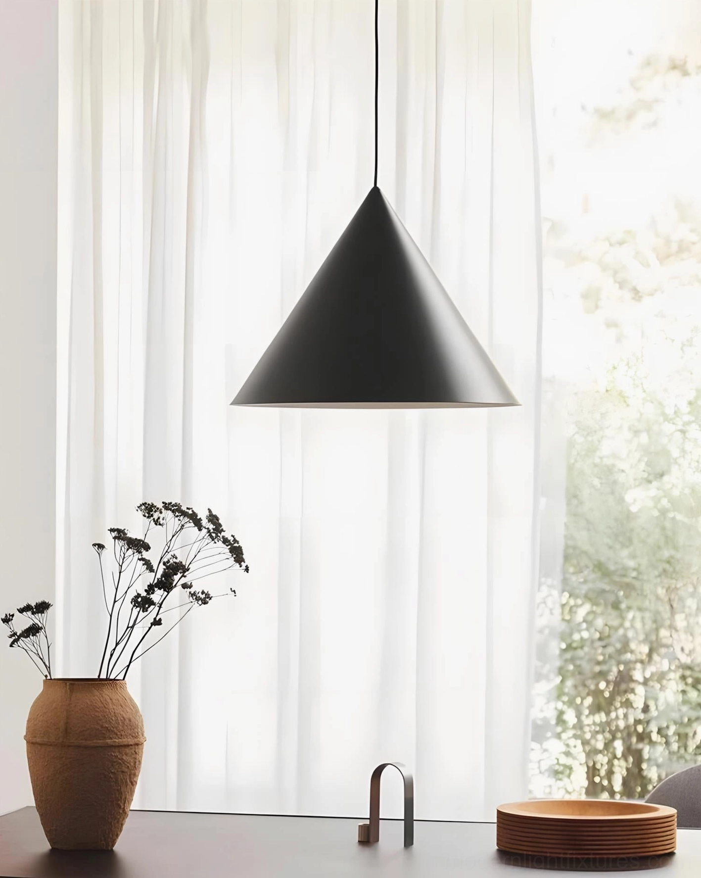 Matte black cone pendant light above kitchen counter, Nordic minimalist residential design
