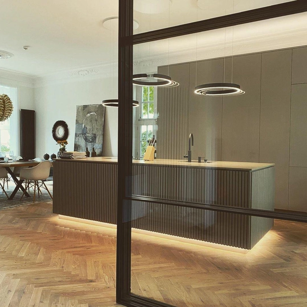 Black and gold halo LED pendant lights showing color finish variety in contemporary interior