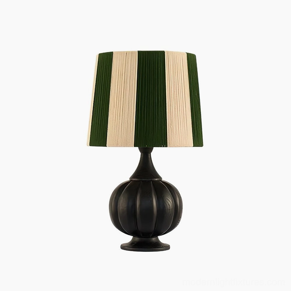 Black and green striped wooden table lamp showcasing bold geometric pattern and pumpkin-shaped wood base