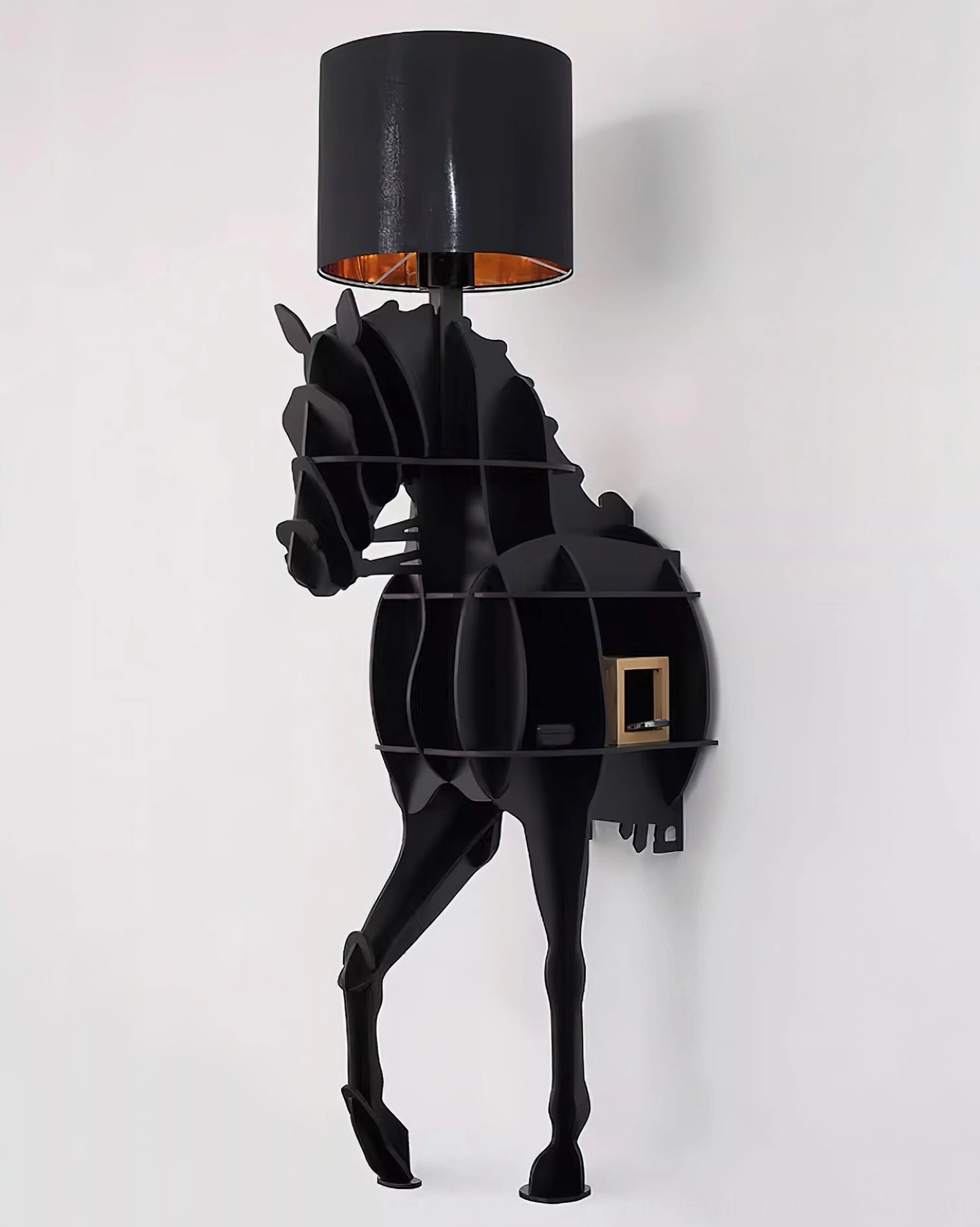 Black horse floor lamp with sculptural body and side storage compartment on white studio background