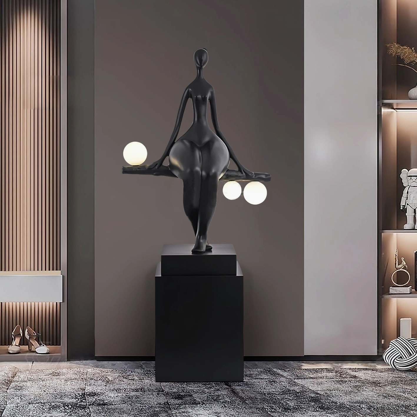 Matte black resin human sculpture floor lamp in modern entryway, minimalist luxury décor with square pedestal base