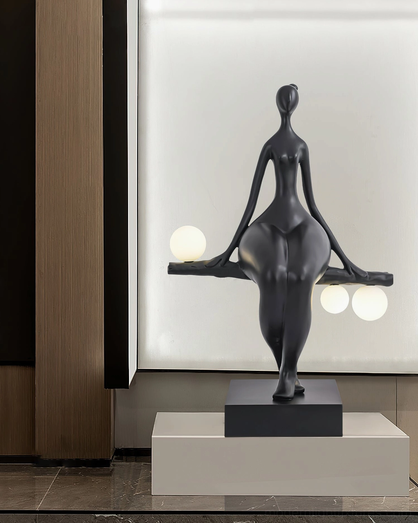 Black matte resin human figurine floor lamp with frosted glass orbs, modern residential living space interior design