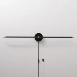 Matte black plug-in wall lamp front view displaying sleek horizontal bar fixture with attached power cord