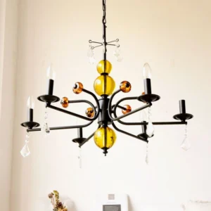 Vintage candle style chandelier with amber glass and crystal drops warm interior lighting