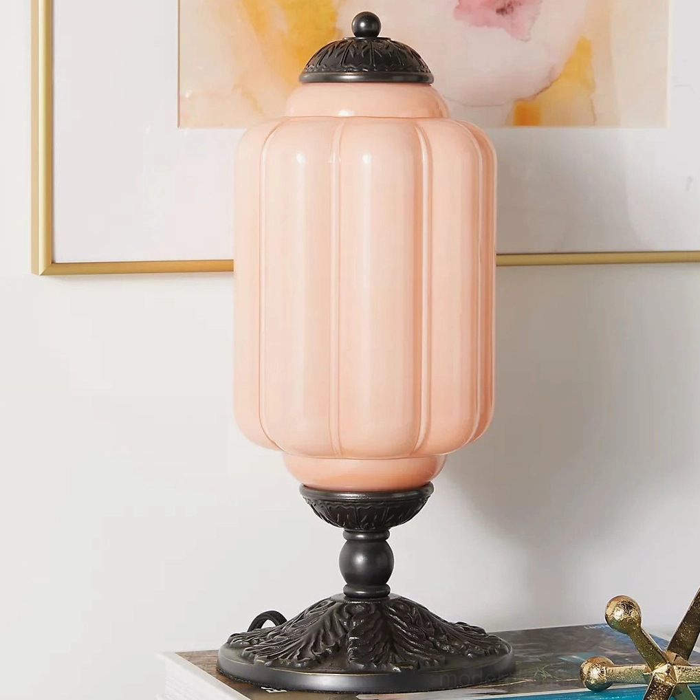 Metal black and milky apricot Eloise fluted glass table lamp full product view with warm glow