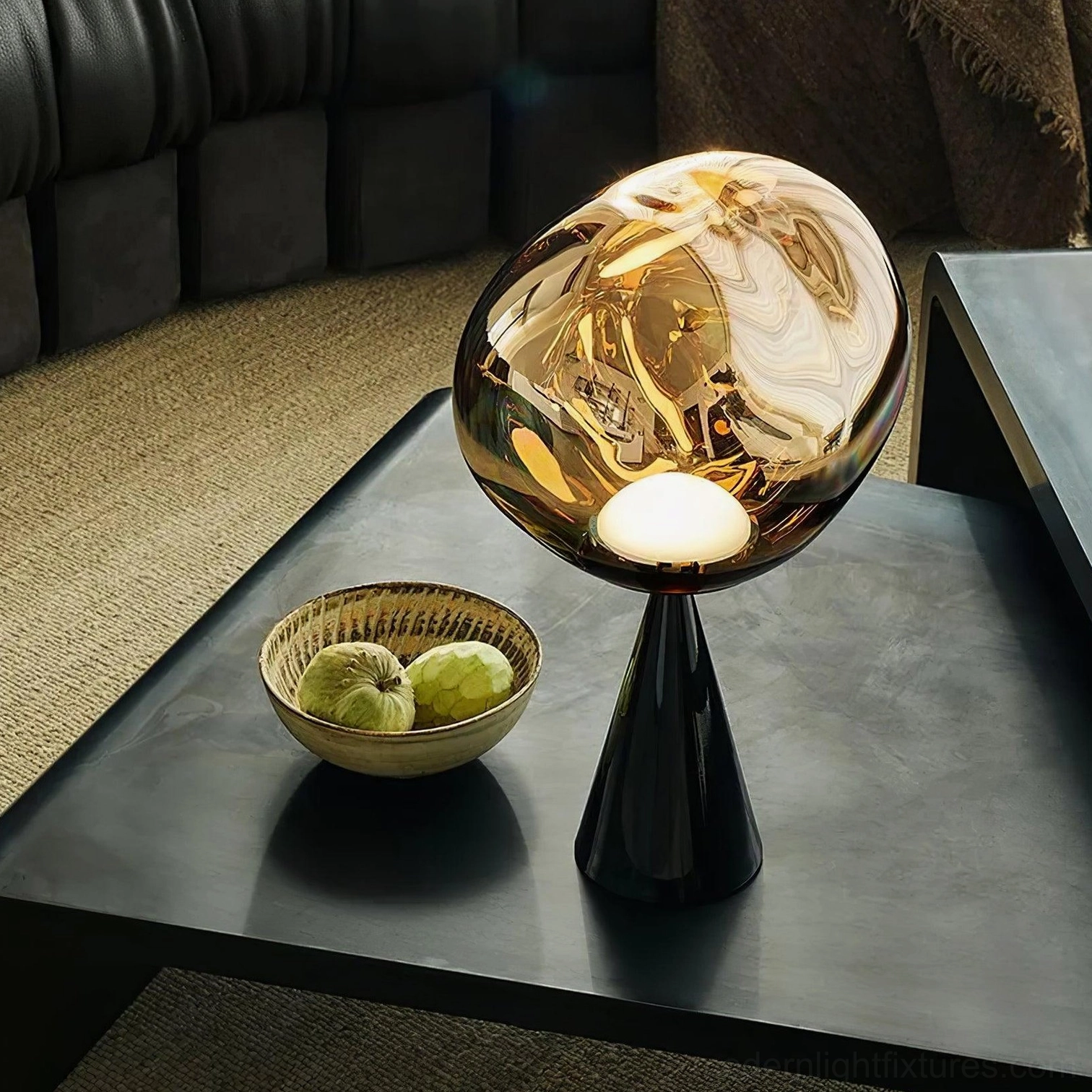 Molten glass cone table lamp black base three-quarter view living room coffee table with decor