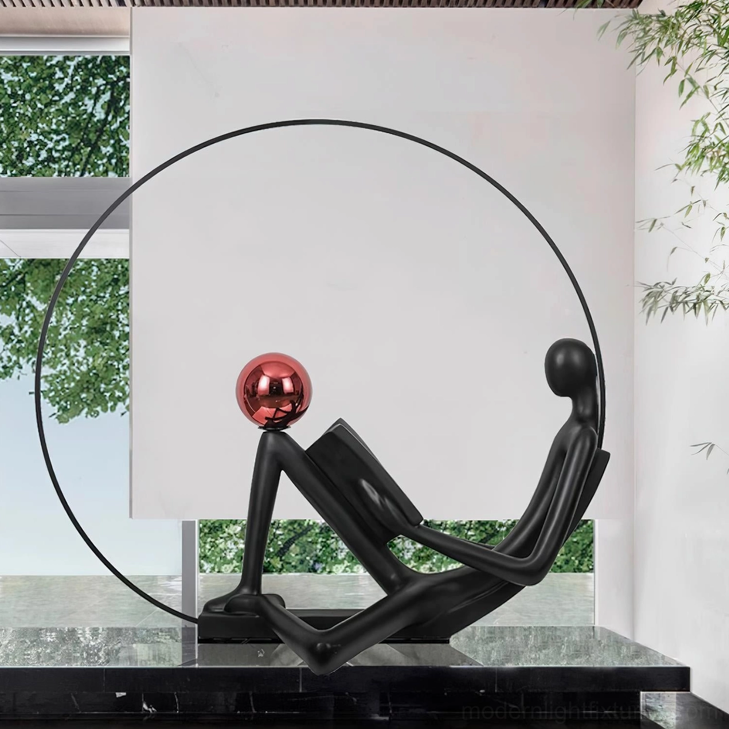 Black reading statue floor lamp with geometric red sphere accent, modern luxury interior lighting fixture