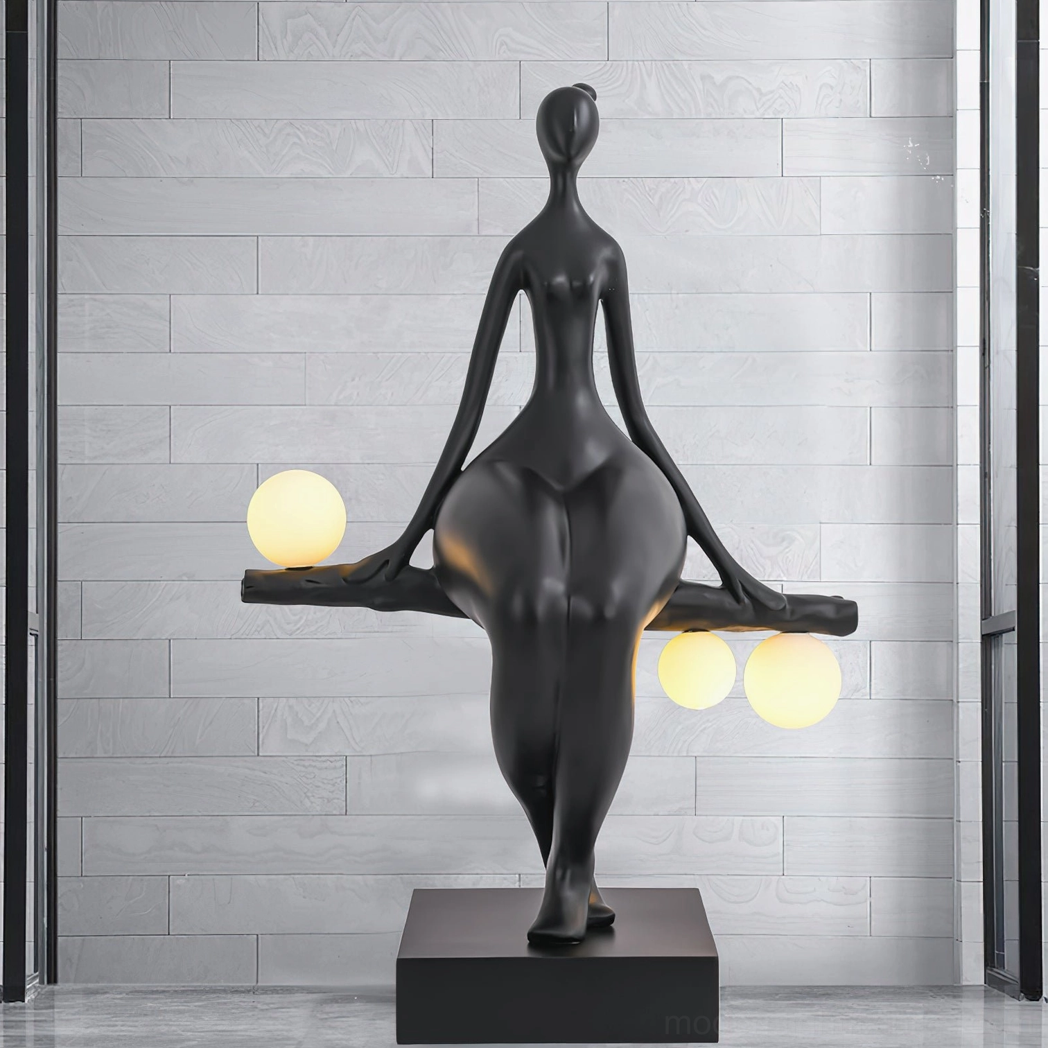 Modern black sculptural floor lamp in contemporary interior with polished tile flooring, minimalist luxury home décor