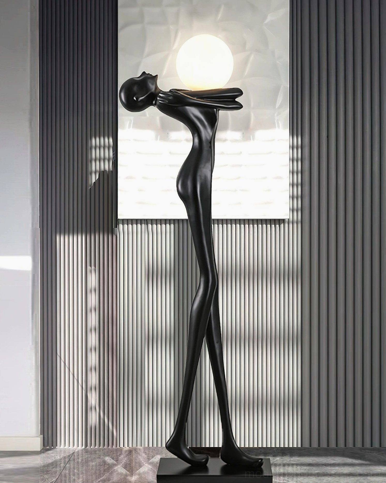 Black sculpture floor lamp modern home setting, artistic lighting fixture, minimalist aesthetic room