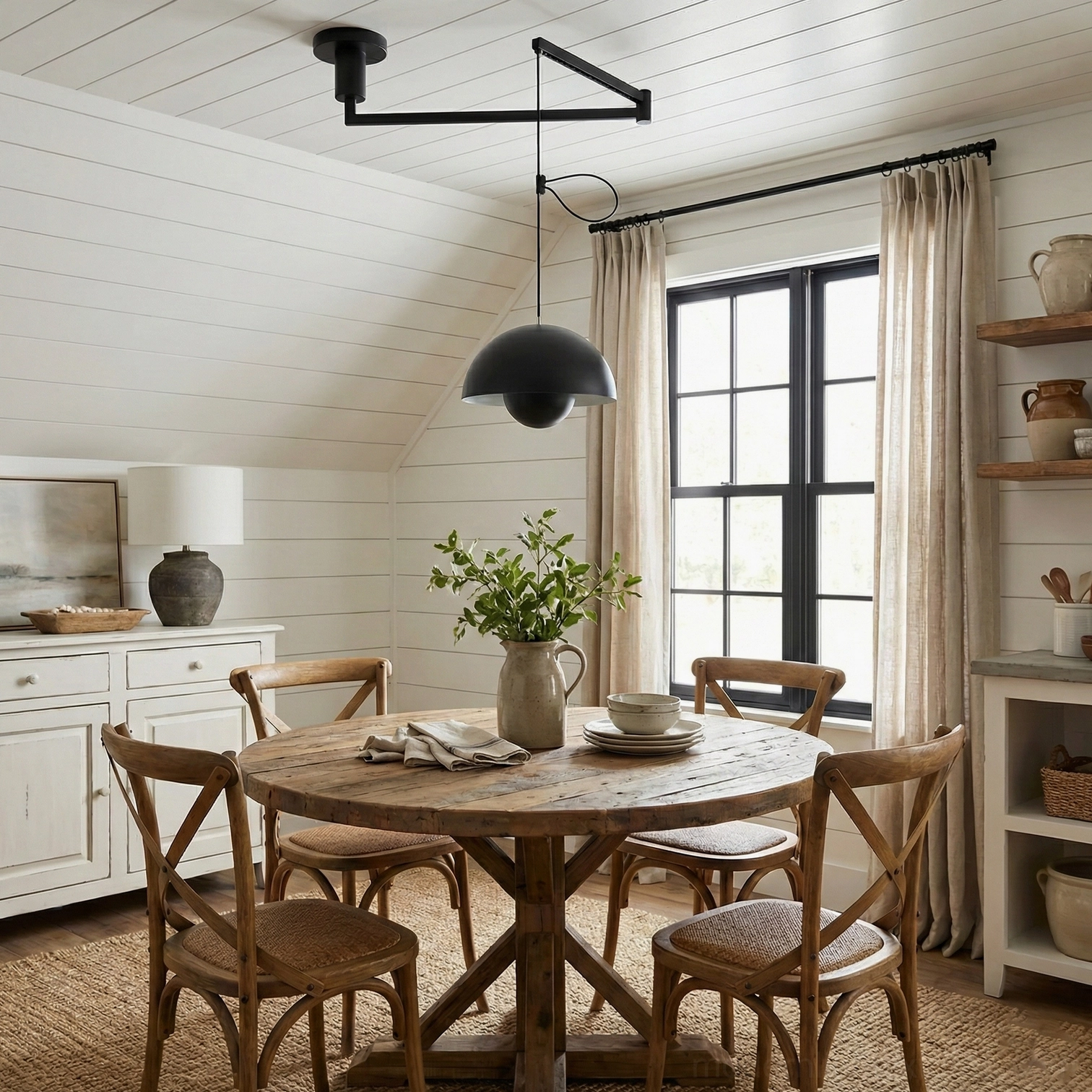 Black swing arm pendant light matte finish in minimalist farmhouse wooden dining room