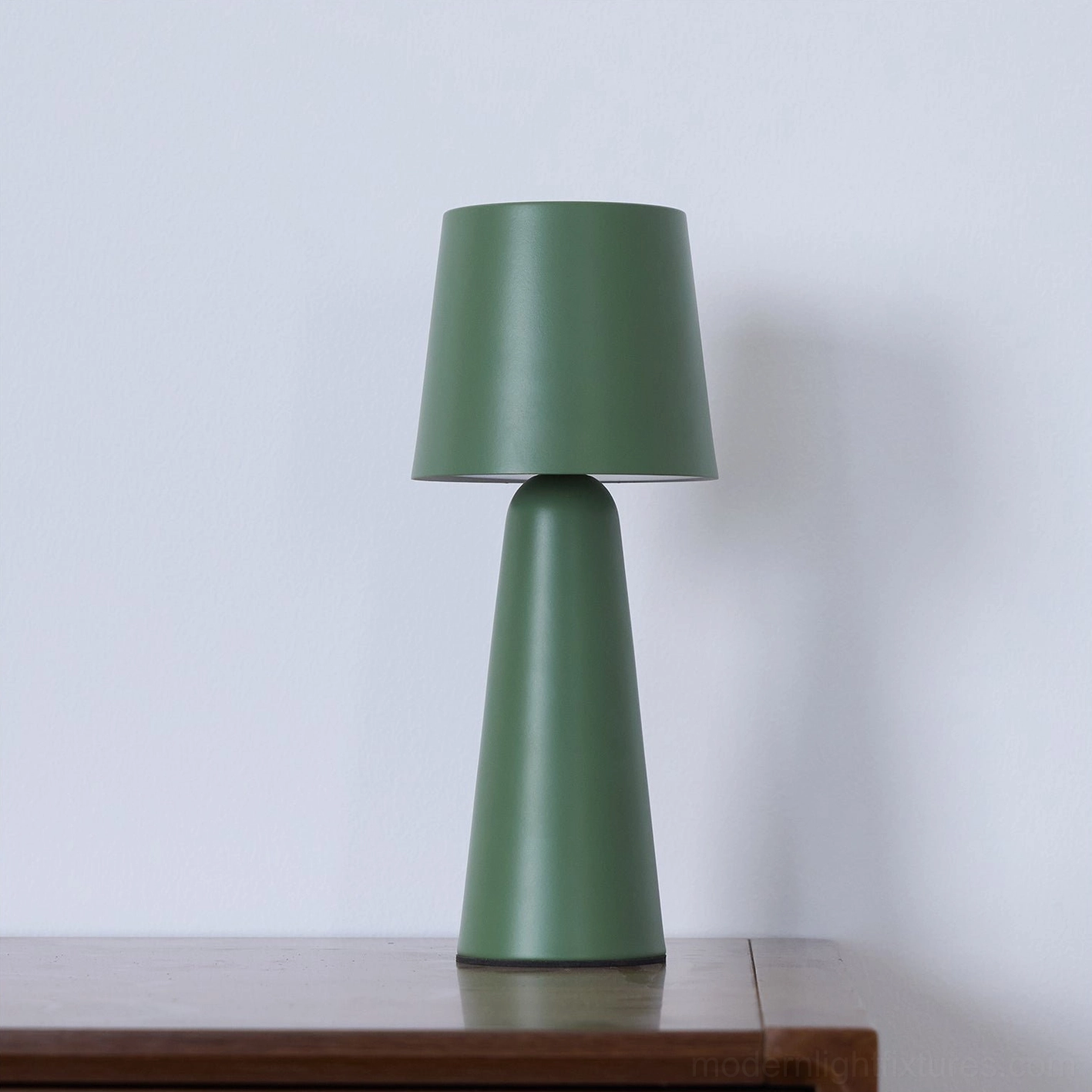 Black tapered table lamp close-up ceramic surface texture matte glossy finish