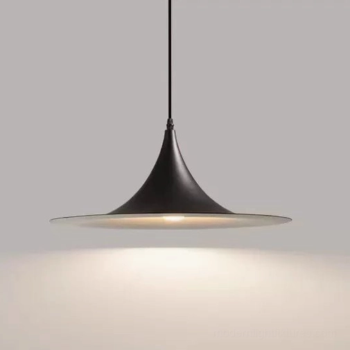 Black matte trumpet pendant light with low-angle view showing warm downward lighting