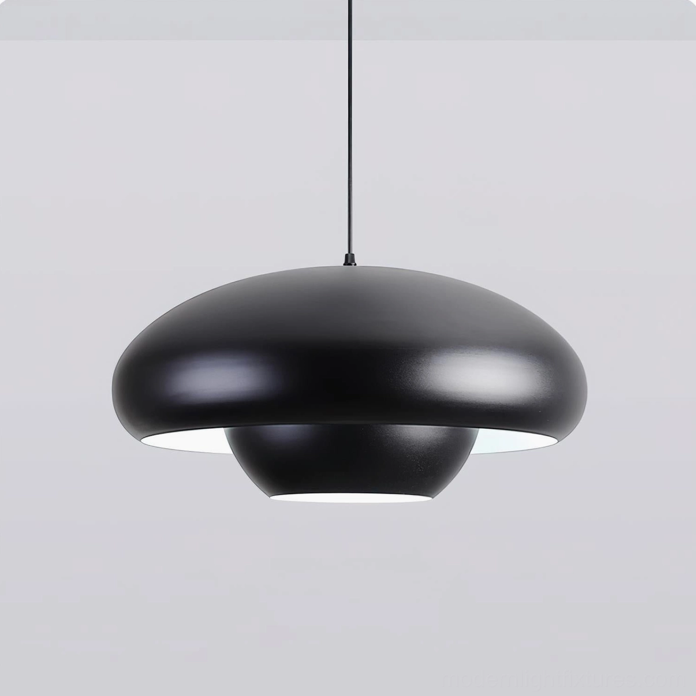 Black Vario dome pendant light close-up detail, showcasing double-layer disc design and minimalist aesthetic