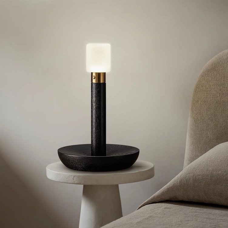 Black finish portable wooden table lamp side profile minimalist bedroom neutral bedding contemporary design