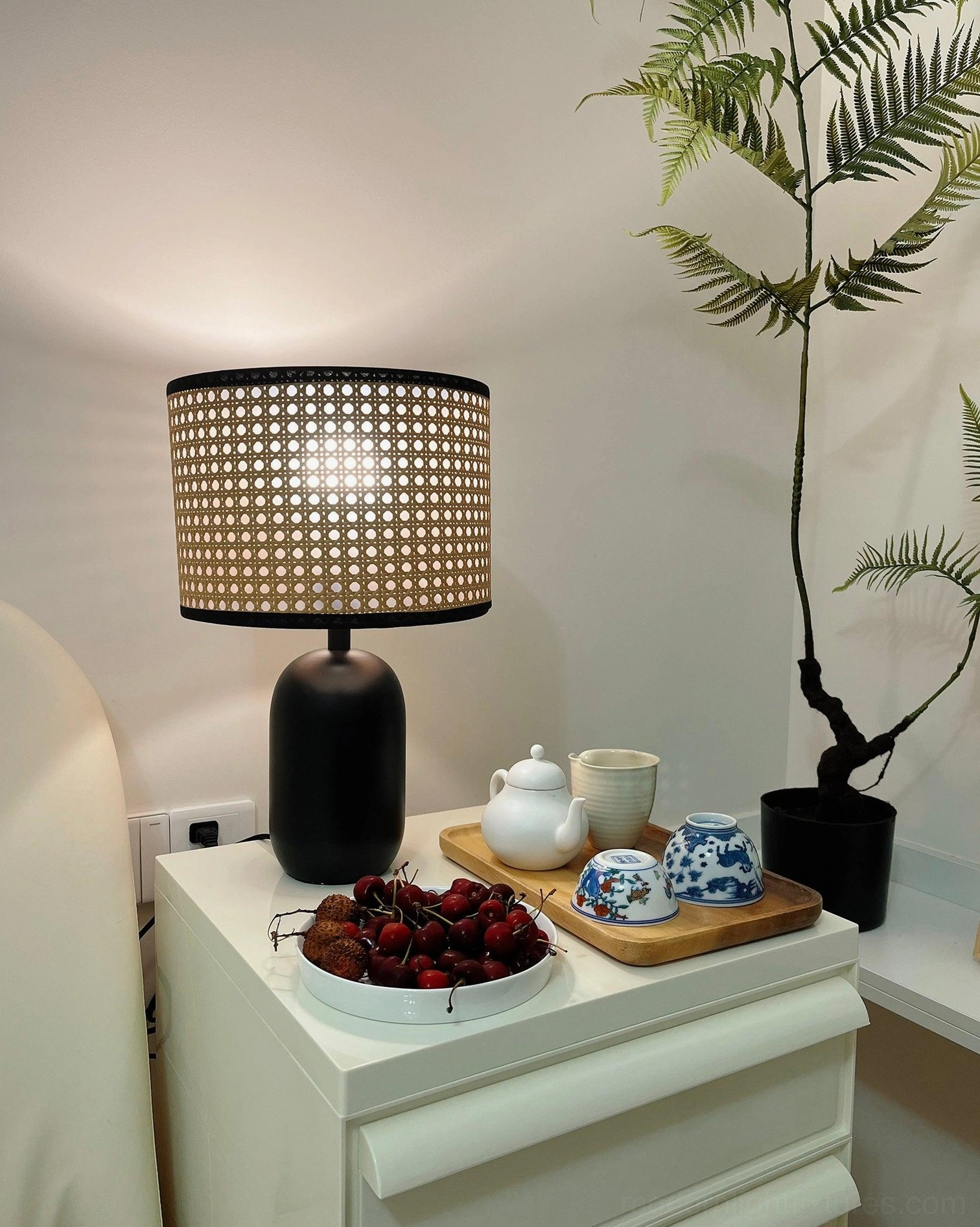 Blakely table lamp soft light diffusion through organic woven shade design