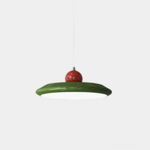 Blakely UFO modern pendant light with green disc shade and red spherical top, studio front view
