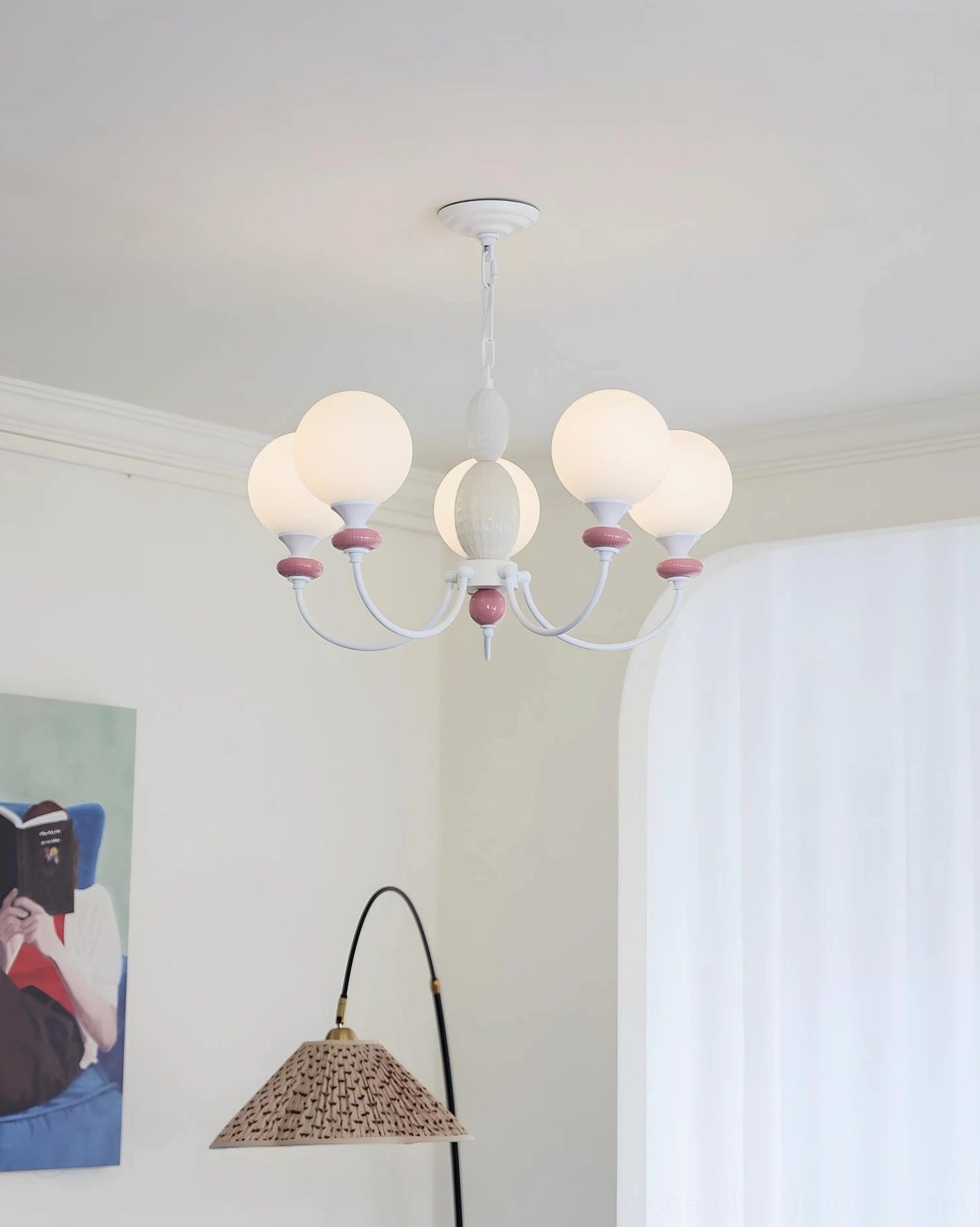 Blanca modern chandelier installation detail showing hanging chain and ceiling mount assembly